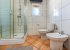 Bathroom with bidet and shower