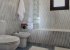 Bathroom with bath and bidet