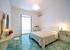 Double bedroom at villa with swimming pool carlotta guesthouse rentals