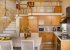 fully equipped kitchen and loft with double bed