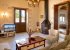 living room with sofas, TV, fireplace