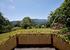 Varanda view of croquet lawn and mountains beyond
