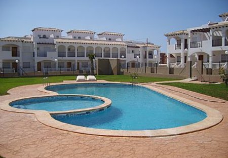 Apartment in Los Balcones, Spain: view of pool