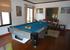 Pool Room with dart board and an assortment of games
