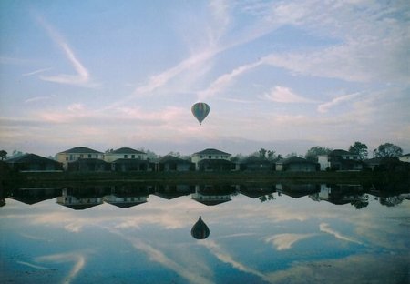 Villa in Sunset Lakes, Florida: Balloons across the lake...amazing view from terrace