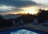 sunset over the swimming pool