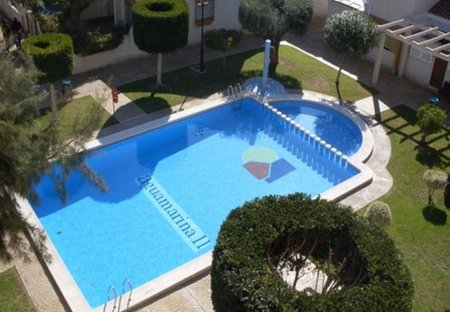 Apartment in Aguamarina, Spain: Communal pool view from terrace