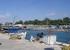 Pier & small marina with fishing boats at Politika beach