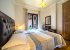 Iro Royal villa in west Chania: Bedroom with twin beds, garden side