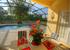 Lanai with table for 8 overlloning pool