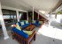 Locally-made veranda furniture for lounging and dining outside.