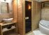 Ensuite master bathroom with sauna and whirlpool bath tub.