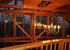 High ceiling area above the living room, glass facade on three levels