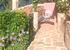 Path to Garden Bedroom above Patio.